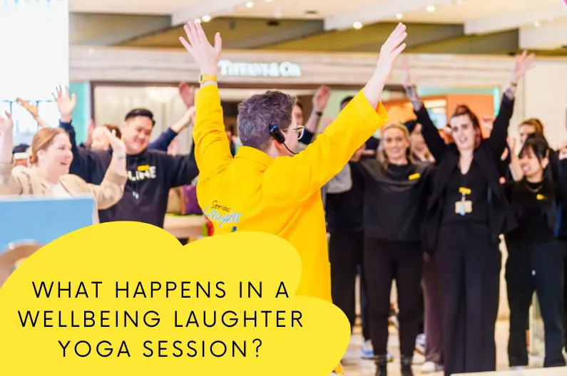 Sunny Turner delivering a Laughter Yoga corporate wellbeing session at Selfridges, Manchester