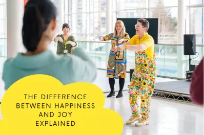 Corporate team participating in Laughter Yoga workplace wellbeing session with Sunny Turner