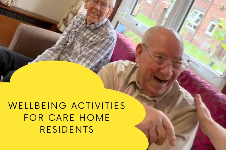 Care home residents taking part in wellbeing activities, smiling and laughing during a seated Joyful Wellbeing Boost session
